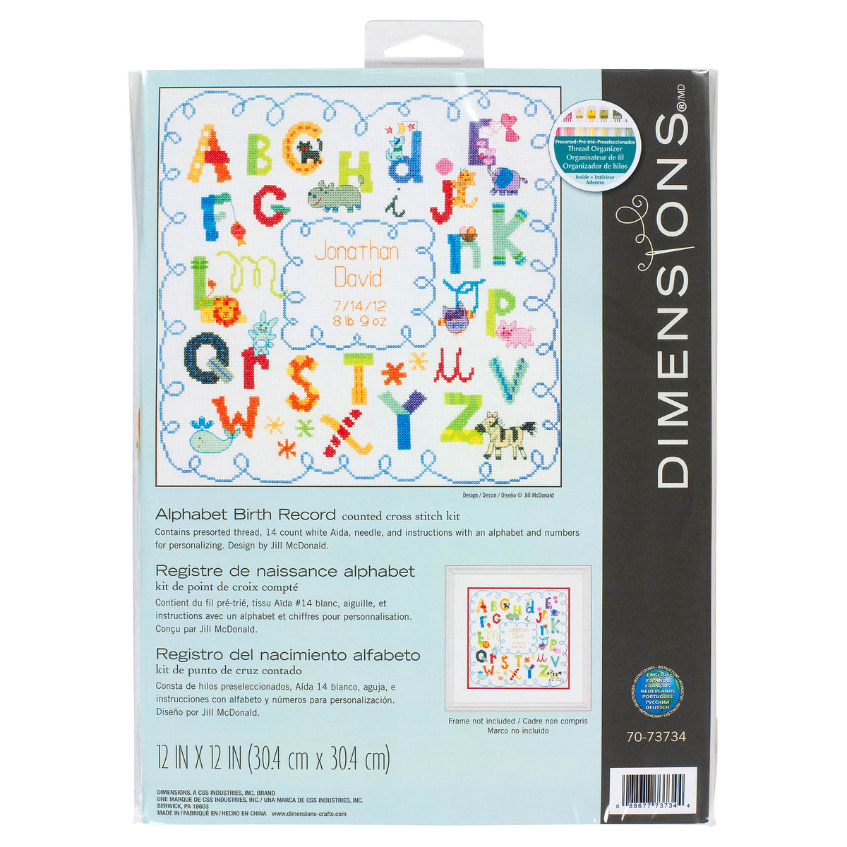 Alphabet birth record cross stitch kit with stitched letters and baby details