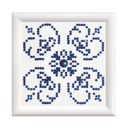 Diamond Dotz Blue on White diamond painting kit with frame showing a blue on white design