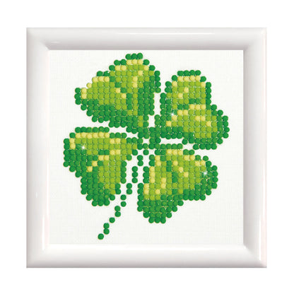 Diamond Dotz Four Leaf Clover diamond painting kit with frame showing a four leaf clover