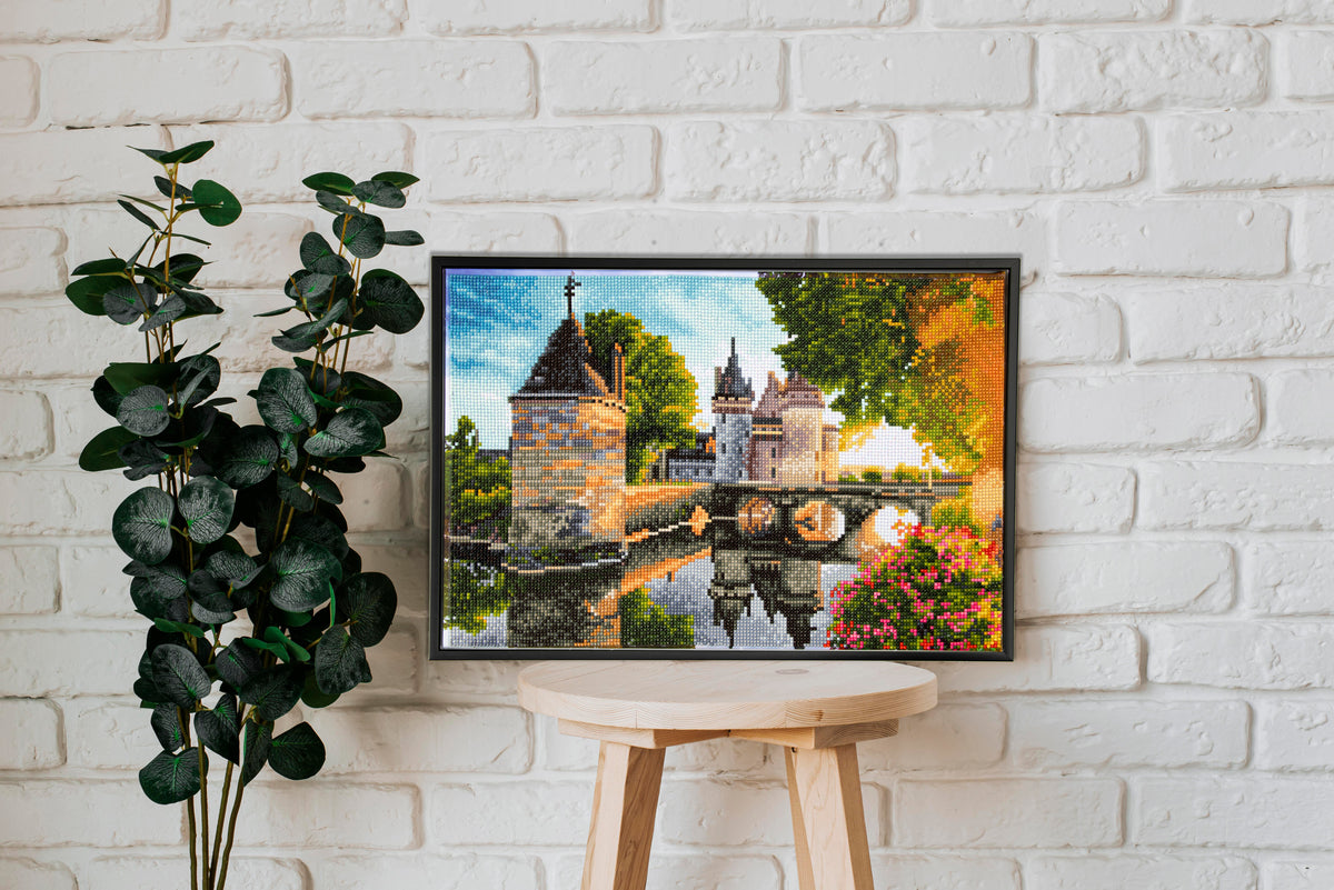 Diamond painting design of a medieval castle beside a river