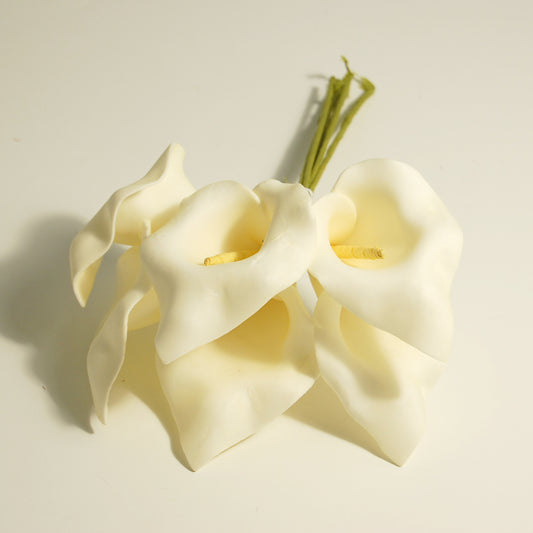 Spray of six ivory foam calla lilies