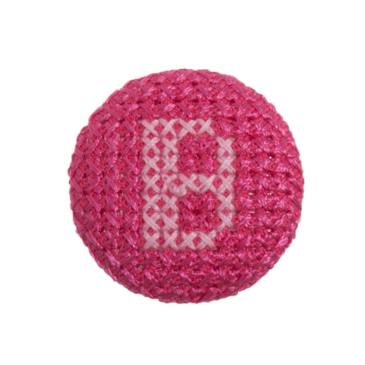 Round button with a fuchsia cross stitch letter B