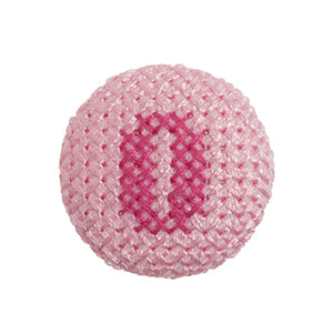 Pink fabric-covered button with a darker pink cross-stitched letter O