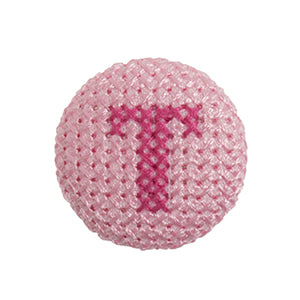 Pink fabric-covered button with a darker pink cross-stitched letter T