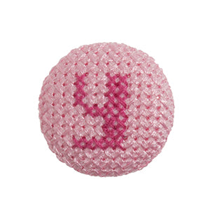 Pink fabric-covered button with a darker pink cross-stitched letter Y