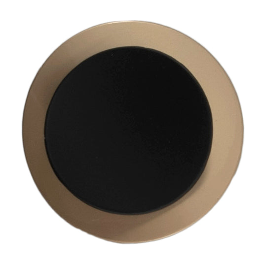 Gold metal button with matt black centre