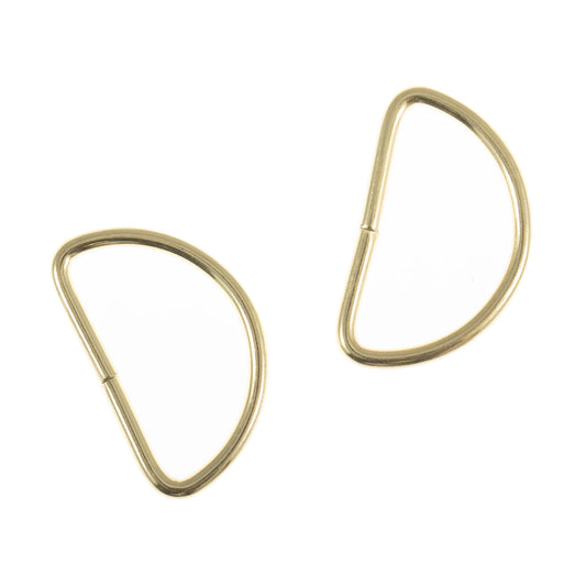 Two gold metal D rings