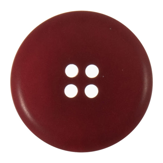 Round red corozo button with four holes