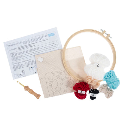 Christmas father christmas punch needle design in a hoop