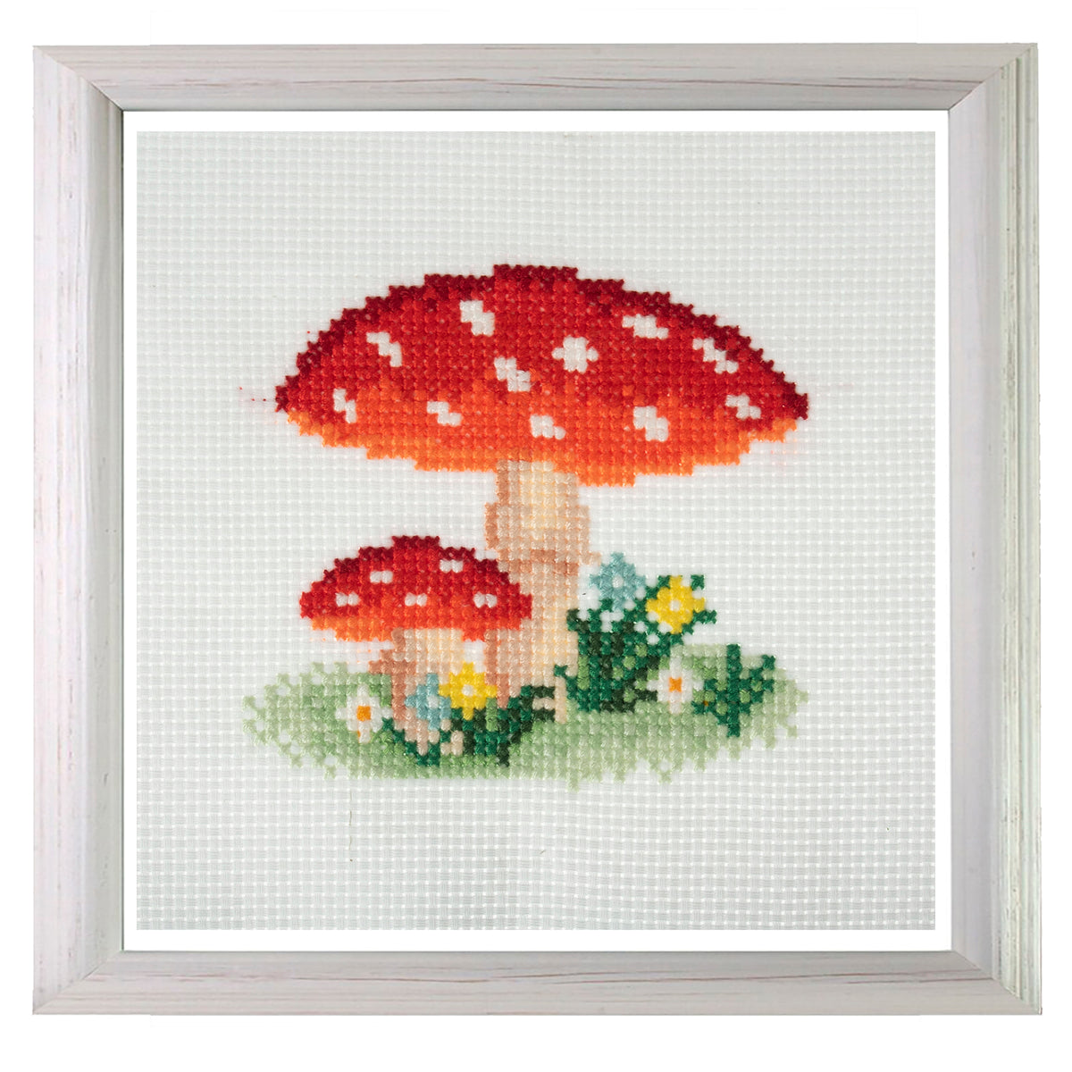 Trimits mini cross stitch kit showing a red spotted toadstool