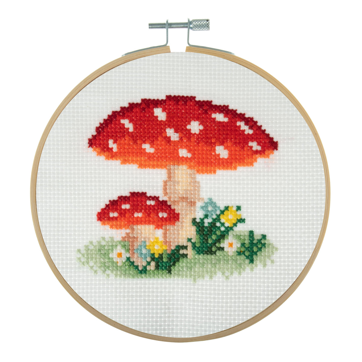 Trimits mini cross stitch kit showing a red spotted toadstool