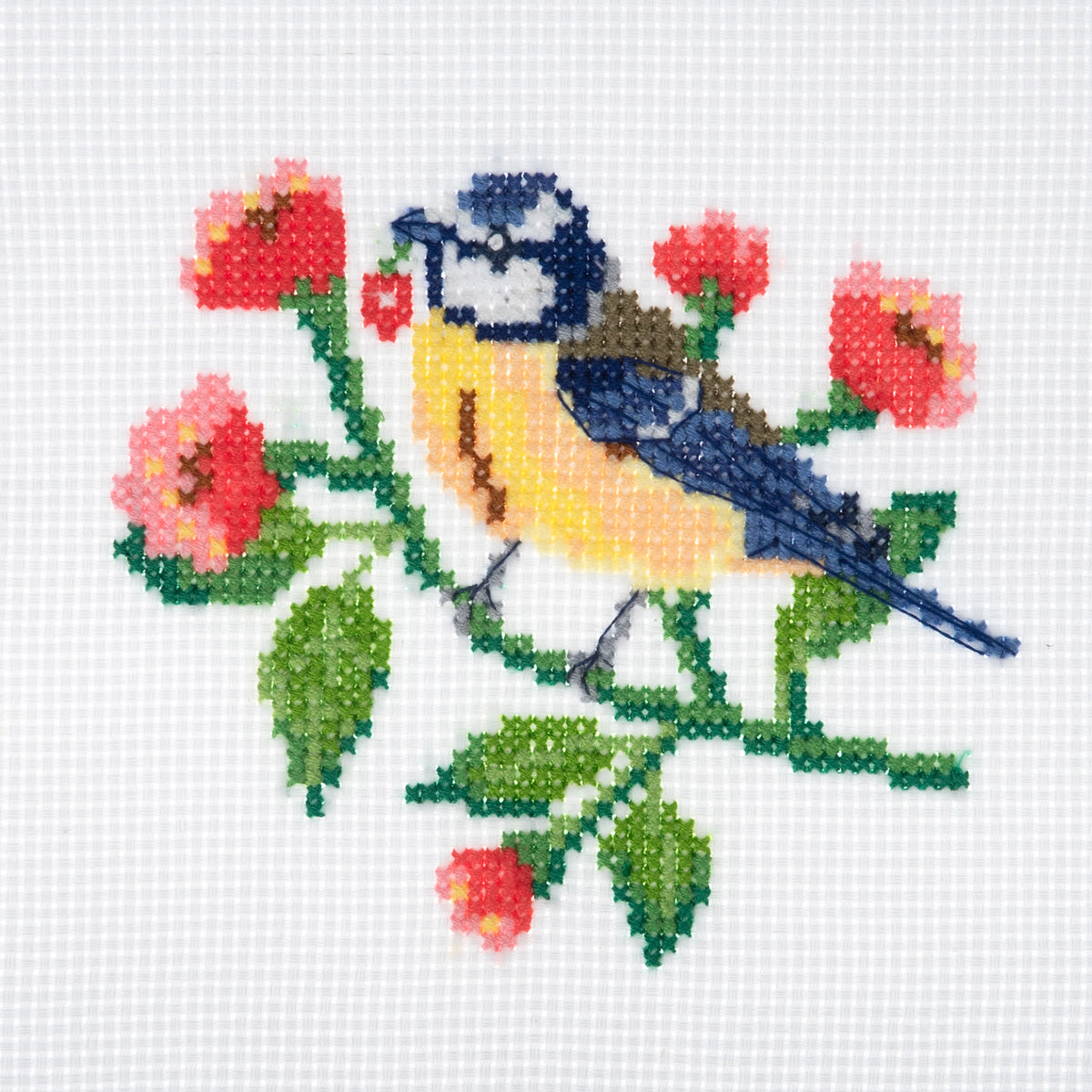 Trimits mini cross stitch kit showing a little bird