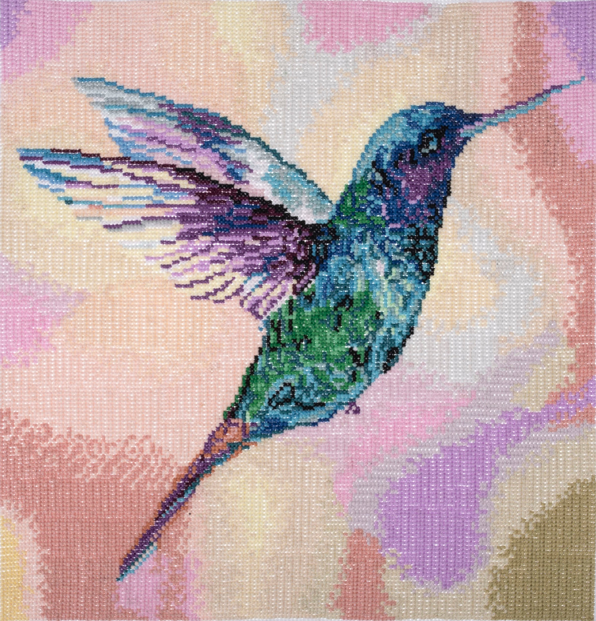 Finished hummingbird counted cross stitch design