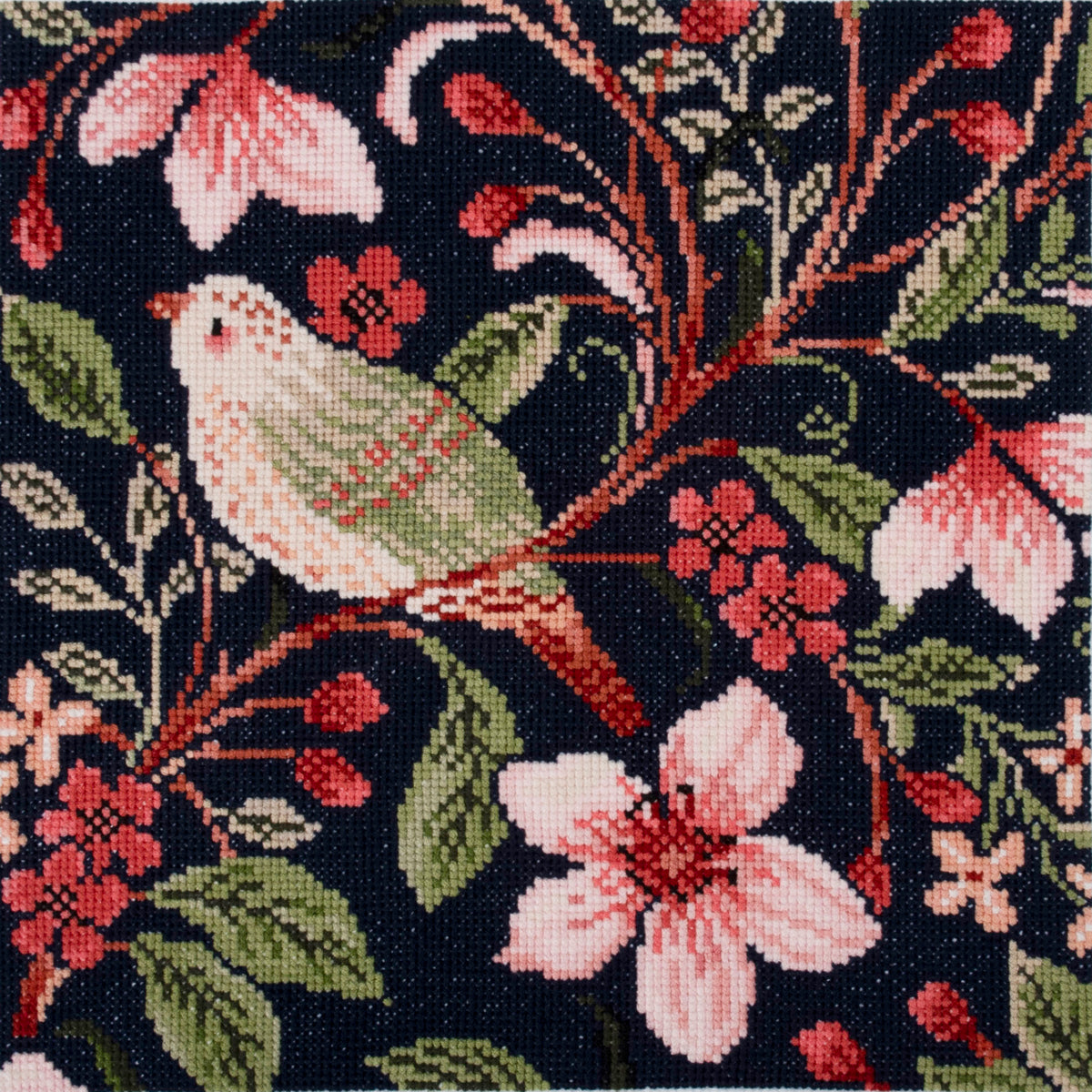 Finished bird blossom counted cross stitch design