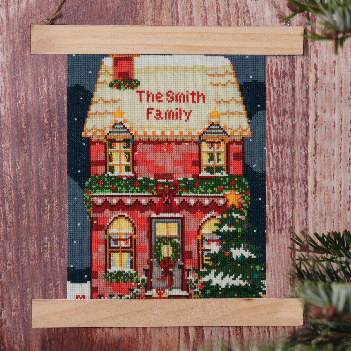 Trimits Festive House cross stitch kit packaging showing the finished design