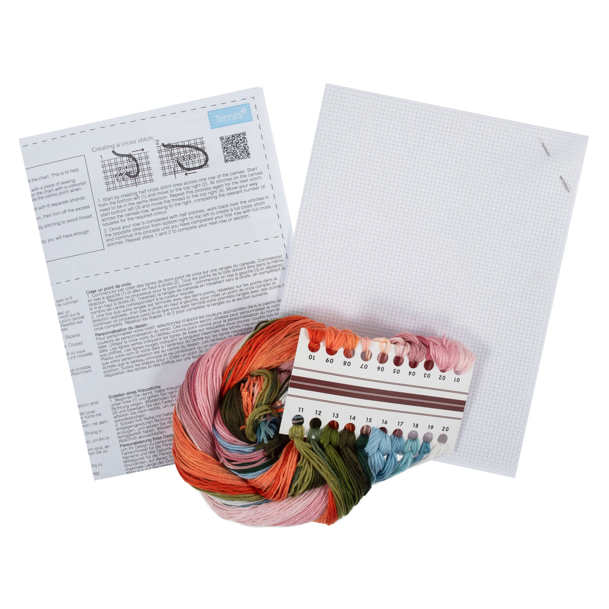 Trimits Holiday cross stitch kit packaging showing the finished design