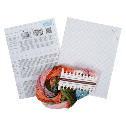 Trimits Holiday cross stitch kit packaging showing the finished design