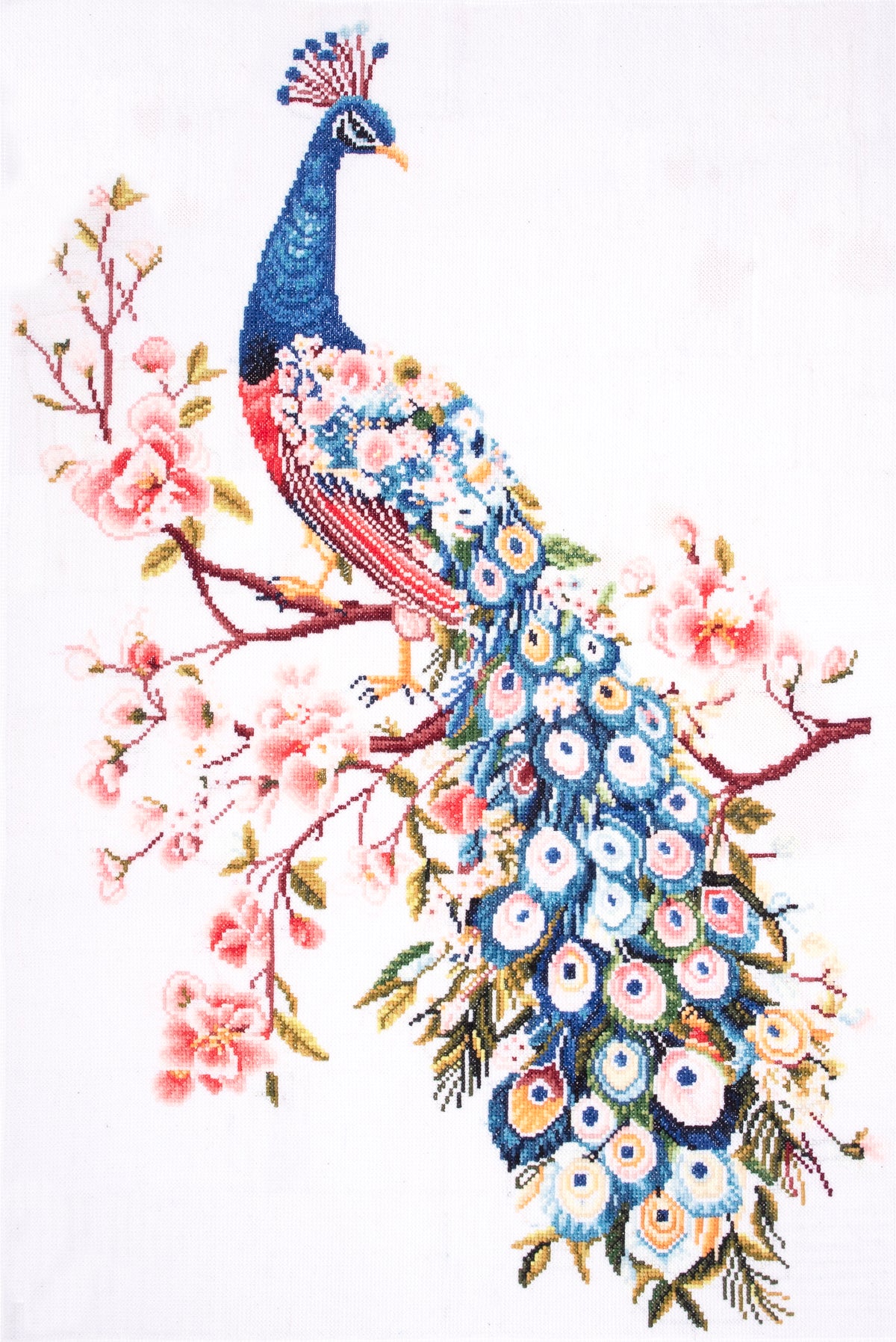 Trimits Peacock cross stitch kit packaging showing the finished design