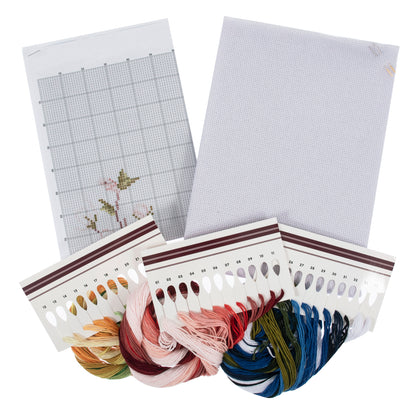 Trimits Peacock cross stitch kit packaging showing the finished design