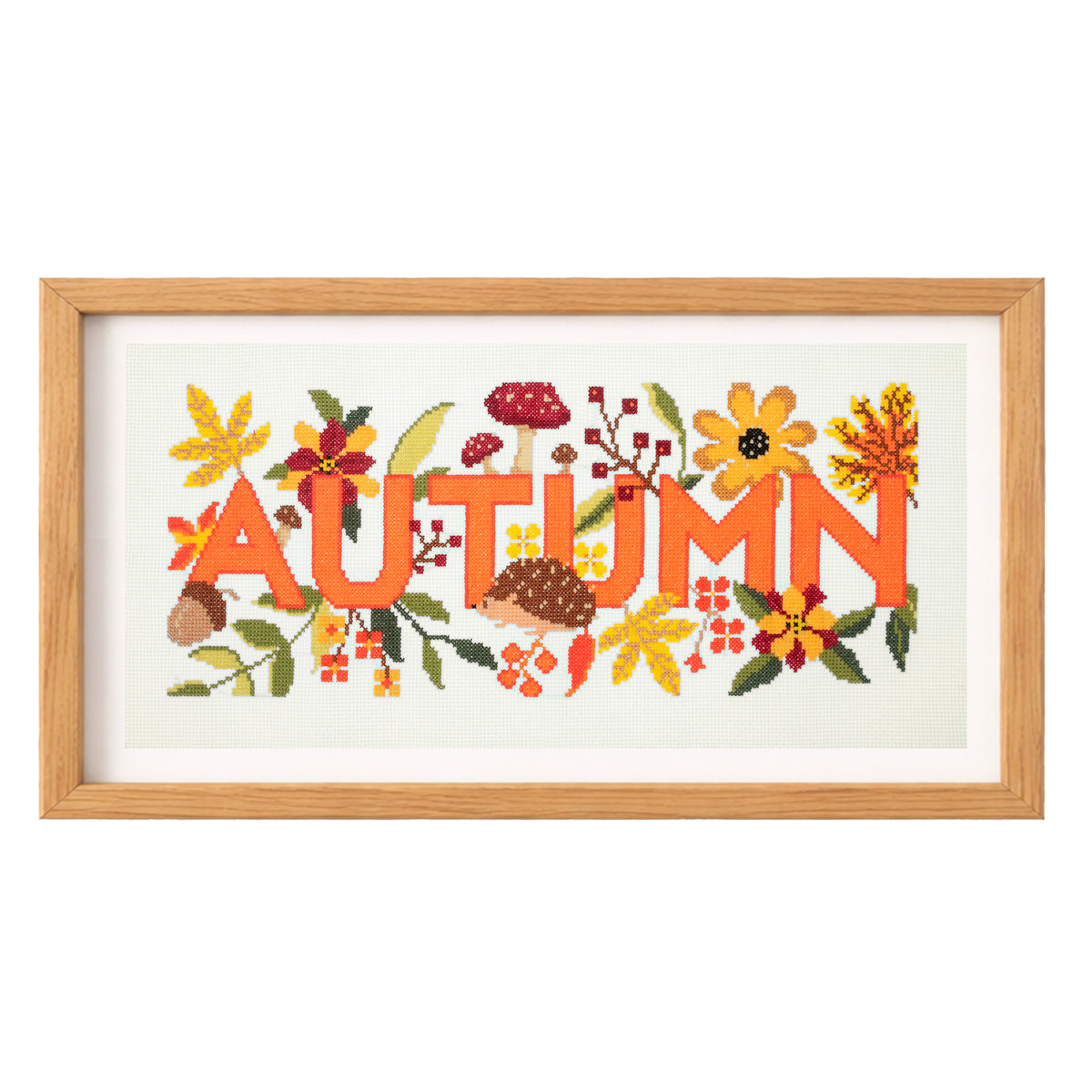 Trimits Autumn cross stitch kit packaging showing the finished design