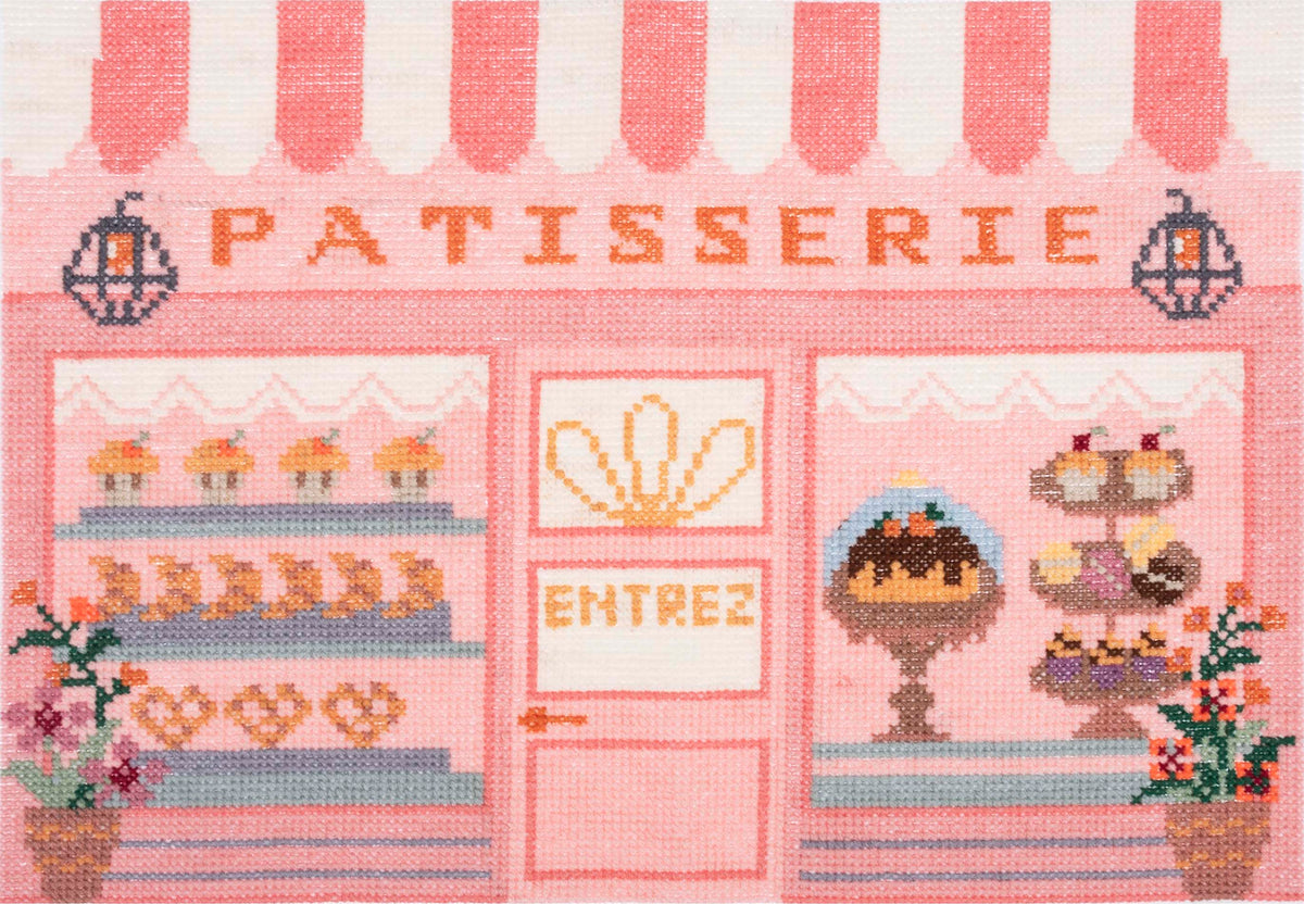 Trimits Patisserie cross stitch kit packaging showing the finished design