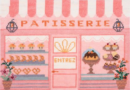 Trimits Patisserie cross stitch kit packaging showing the finished design