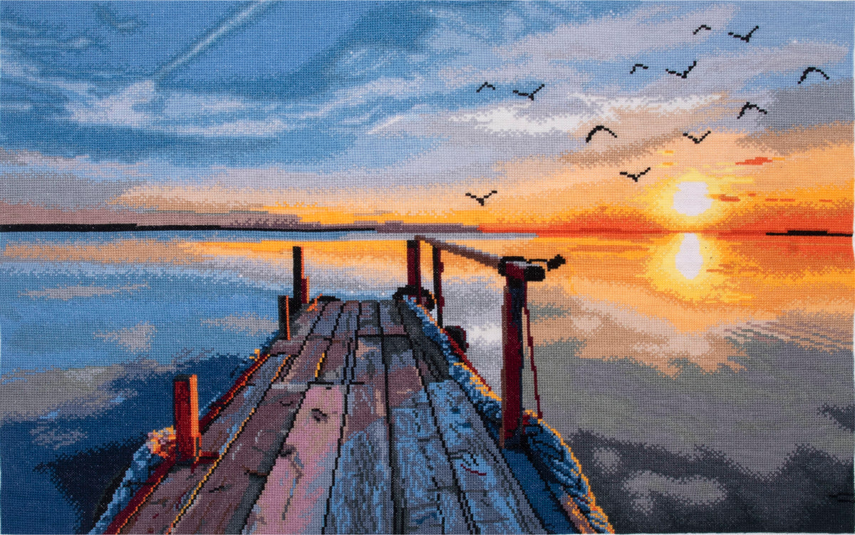 Trimits Sunset cross stitch kit packaging showing the finished design