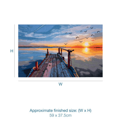 Trimits Sunset cross stitch kit packaging showing the finished design