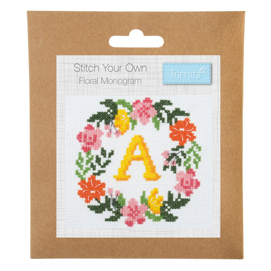 Trimits mini cross stitch kit showing a floral wreath framing a monogram letter