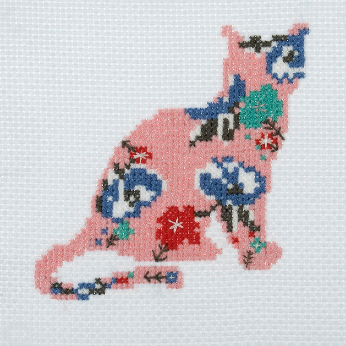 Trimits mini cross stitch kit showing a cute cat