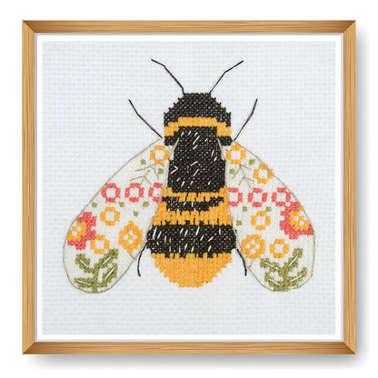 Trimits mini cross stitch kit showing a striped bumble bee