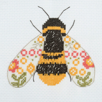 Trimits mini cross stitch kit showing a striped bumble bee