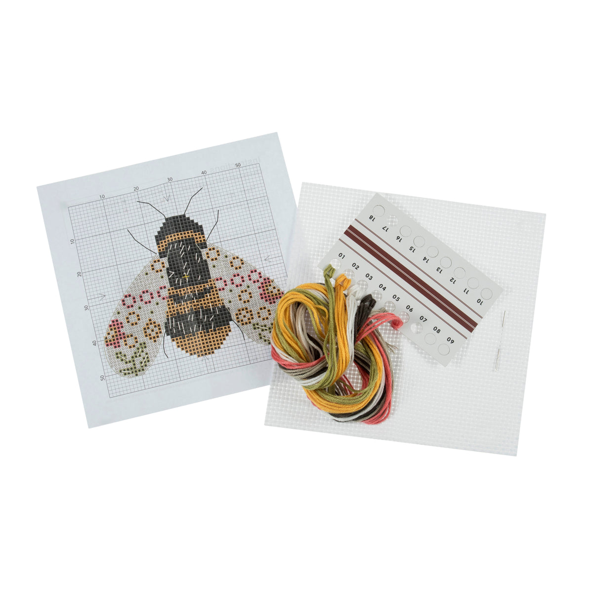 Trimits mini cross stitch kit showing a striped bumble bee