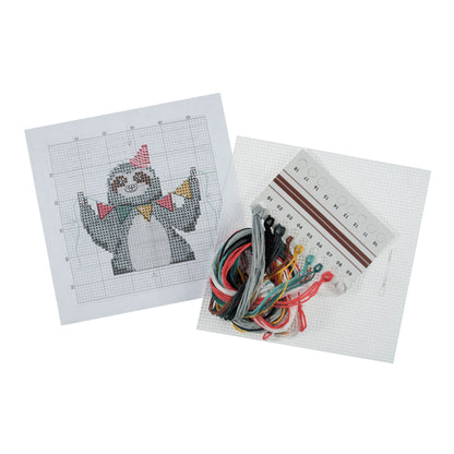 Trimits mini cross stitch kit showing a smiling sloth