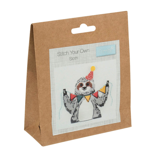 Trimits mini cross stitch kit showing a smiling sloth