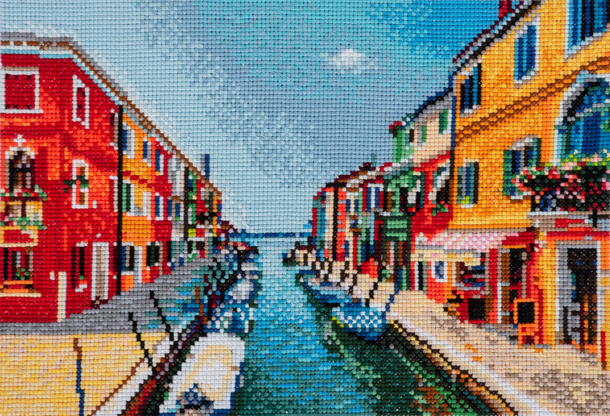 Trimits cross stitch kit showing a Italian summer scene design