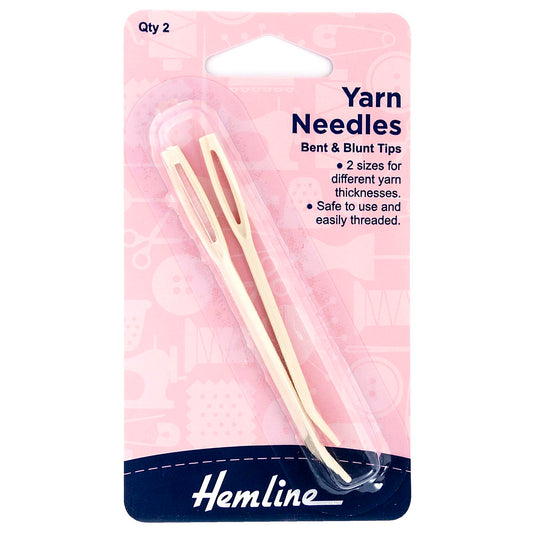 Two Hemline bent tip plastic yarn needles on a card