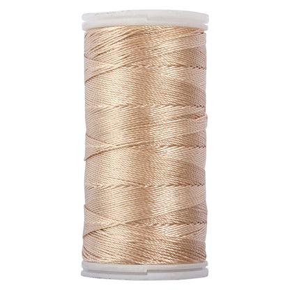 Spool of cream Hemline extra strong polyester thread