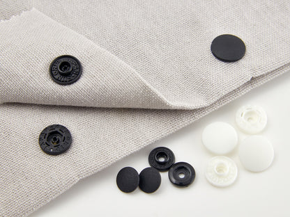Pack of black 9mm plastic snap fasteners