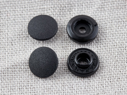 Pack of black 9mm plastic snap fasteners