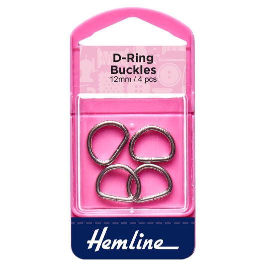 Four nickel metal D rings on a Hemline card