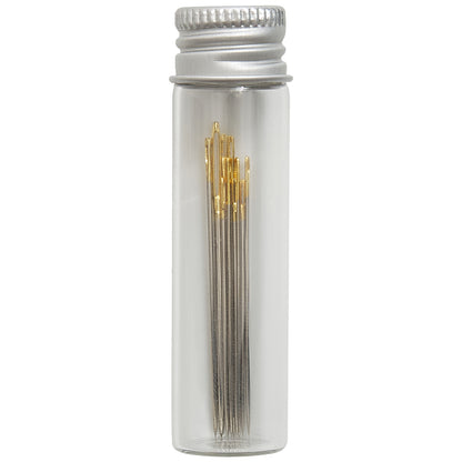 Glass jar of gold eye hand sewing needles
