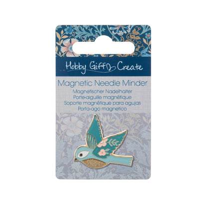 Enamel bird needle minder with gold accents