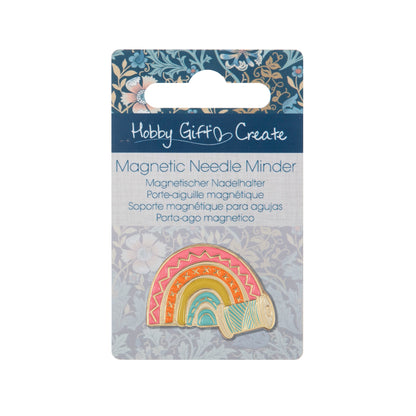 Enamel rainbow and cotton reel needle minder