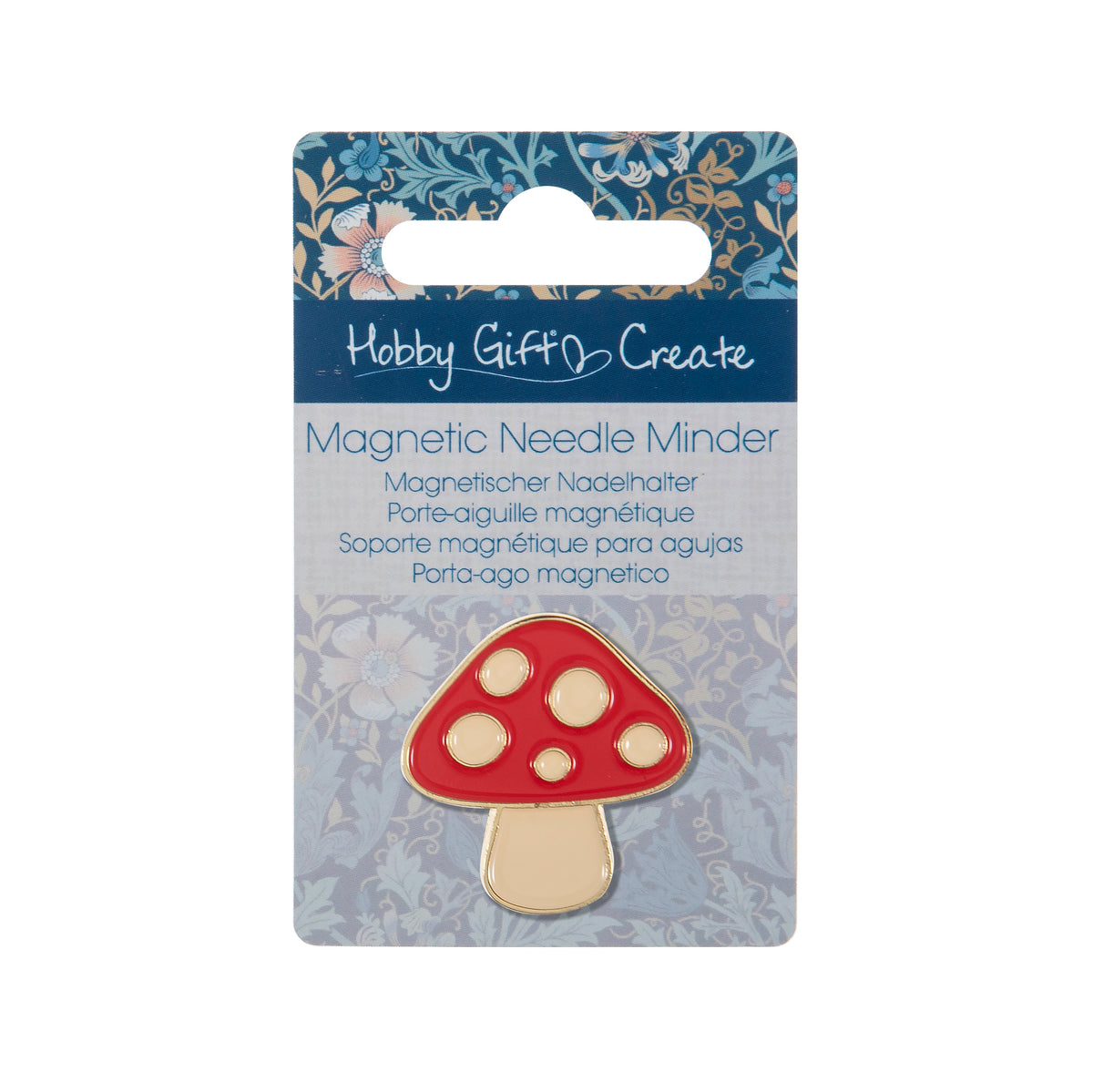 Red and cream enamel toadstool needle minder