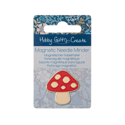Red and cream enamel toadstool needle minder