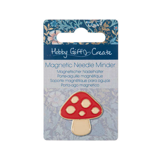 Red and cream enamel toadstool needle minder