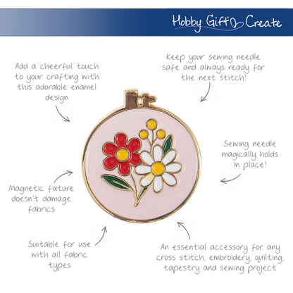 Round enamel magnetic needle minder with a colourful enamel embroidery hoop design with bright floral detailing