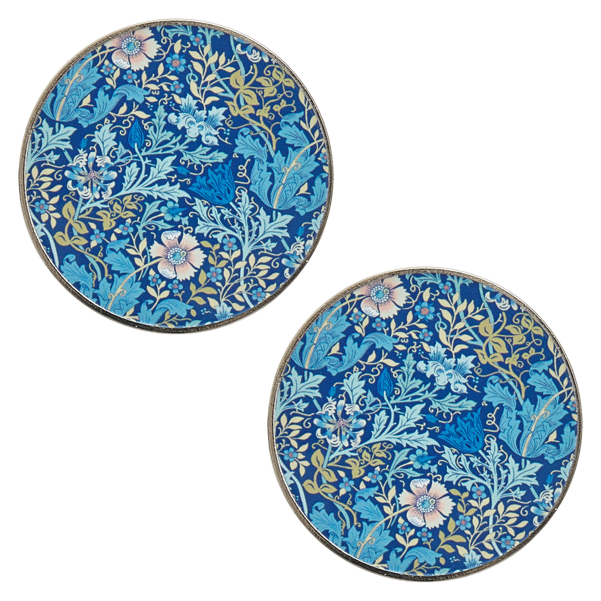 Two round metal pattern weights with woodblock print