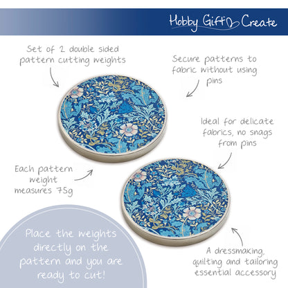 Two round metal pattern weights with woodblock print